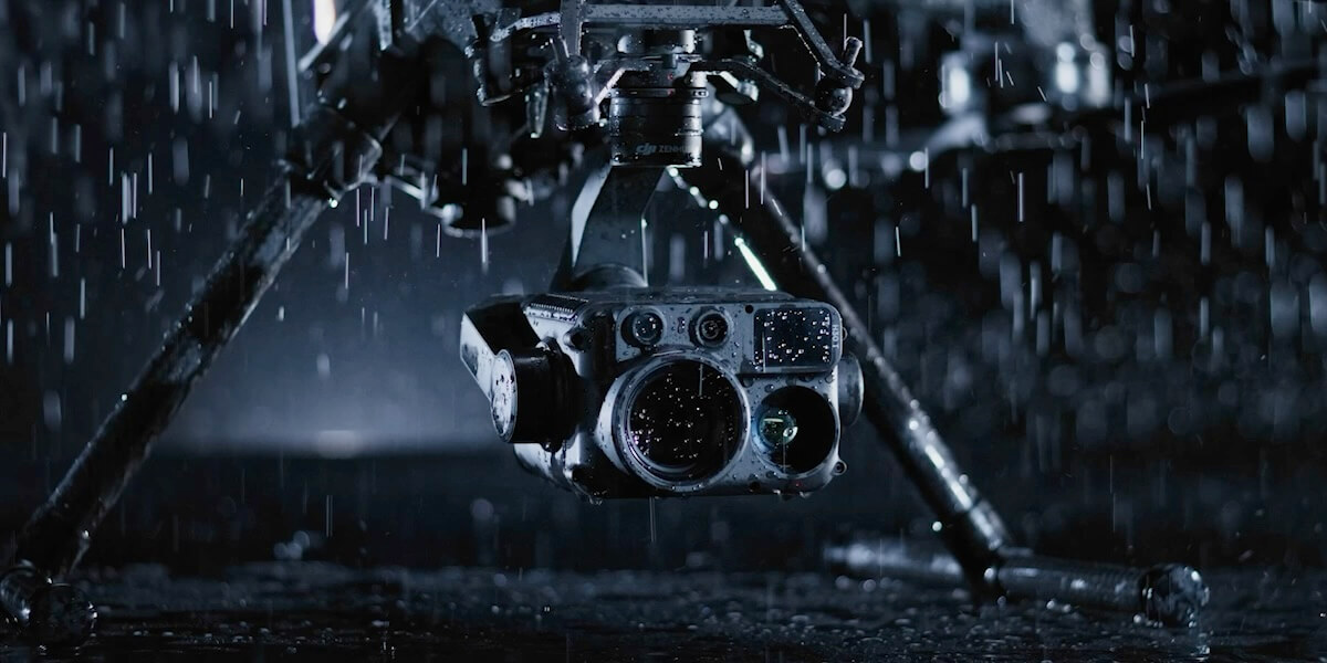 Official DJI environmental-resistance imagery with an H30-series payload. Follow the aircraft and payload operating limits.